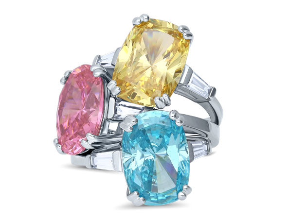 Bold statement 3 stone rings in pastel colors