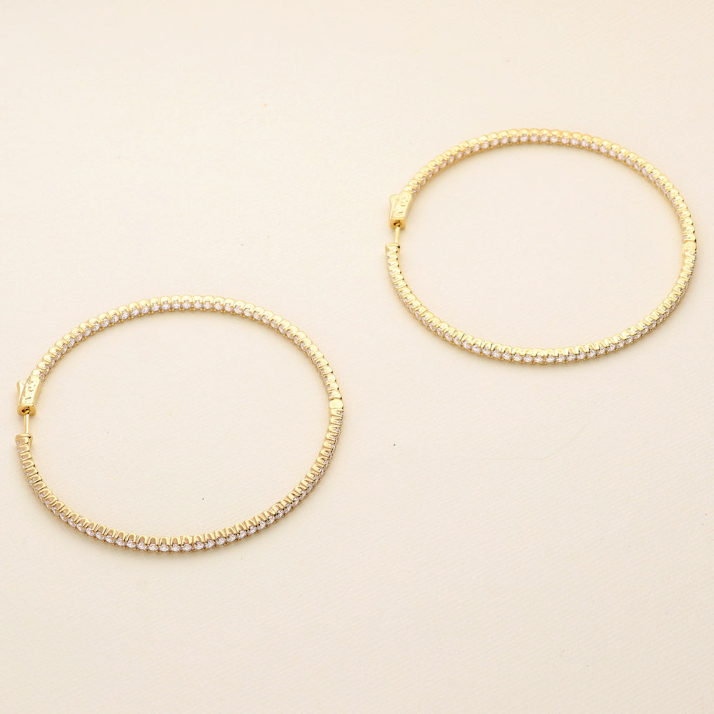 Flatlay view of CZ Large Inside-Out Hoop Earrings in Sterling Silver 2.5 inch, Rose Gold Flashed