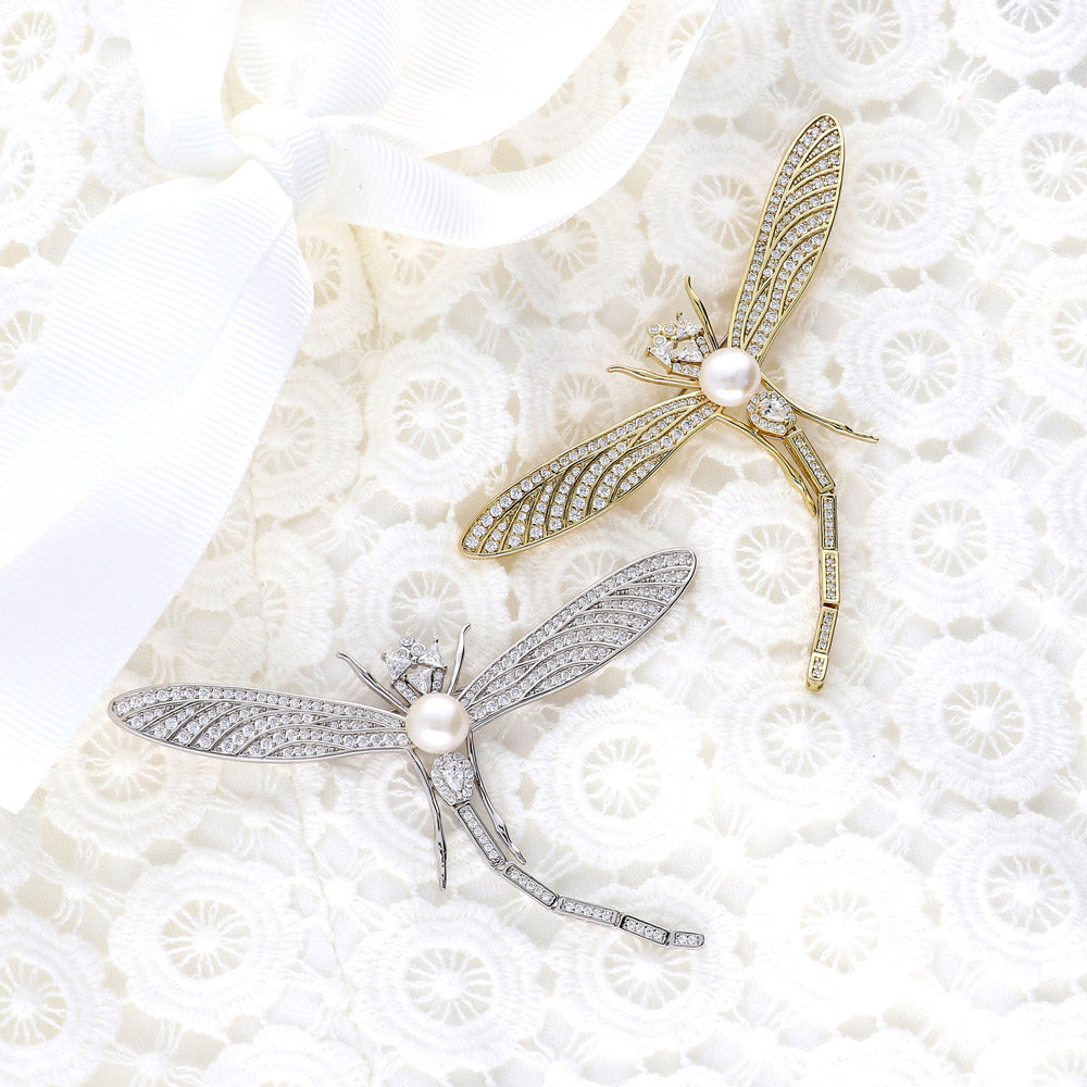 Flatlay view of Dragonfly White Button Freshwater Cultured Pearl Pin in Sterling Silver