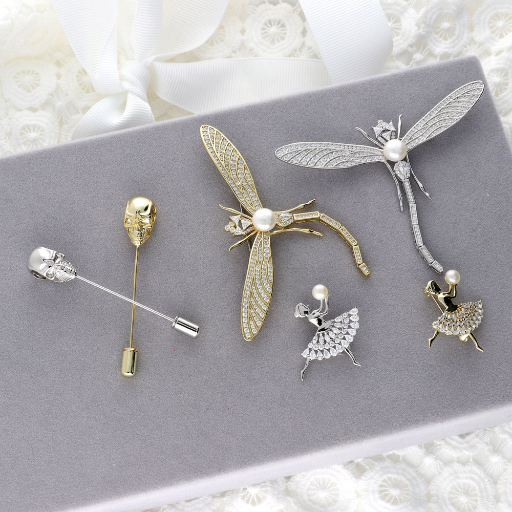 Flatlay view of Dragonfly White Button Freshwater Cultured Pearl Pin in Sterling Silver
