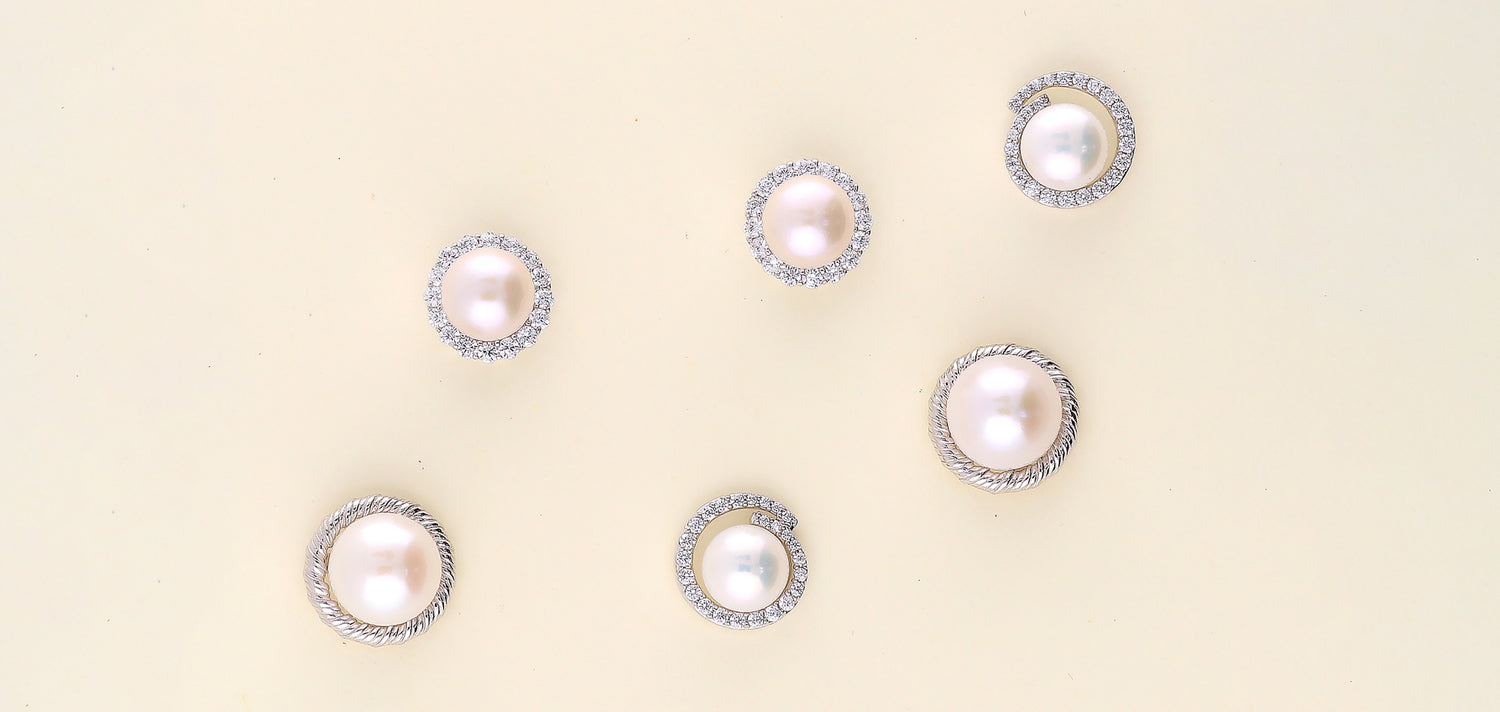 4. Bold Halo Pearl Studs