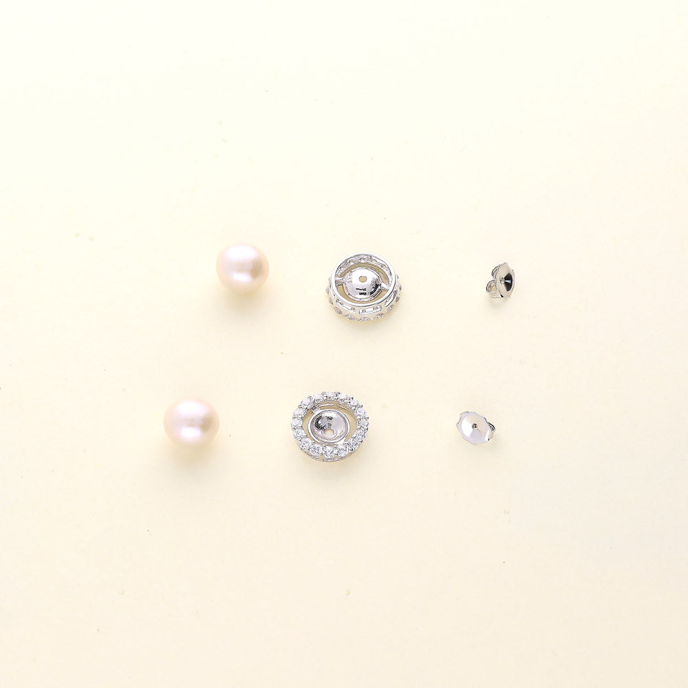 Flatlay view of Halo White Button Cultured Pearl Stud Earrings in Sterling Silver