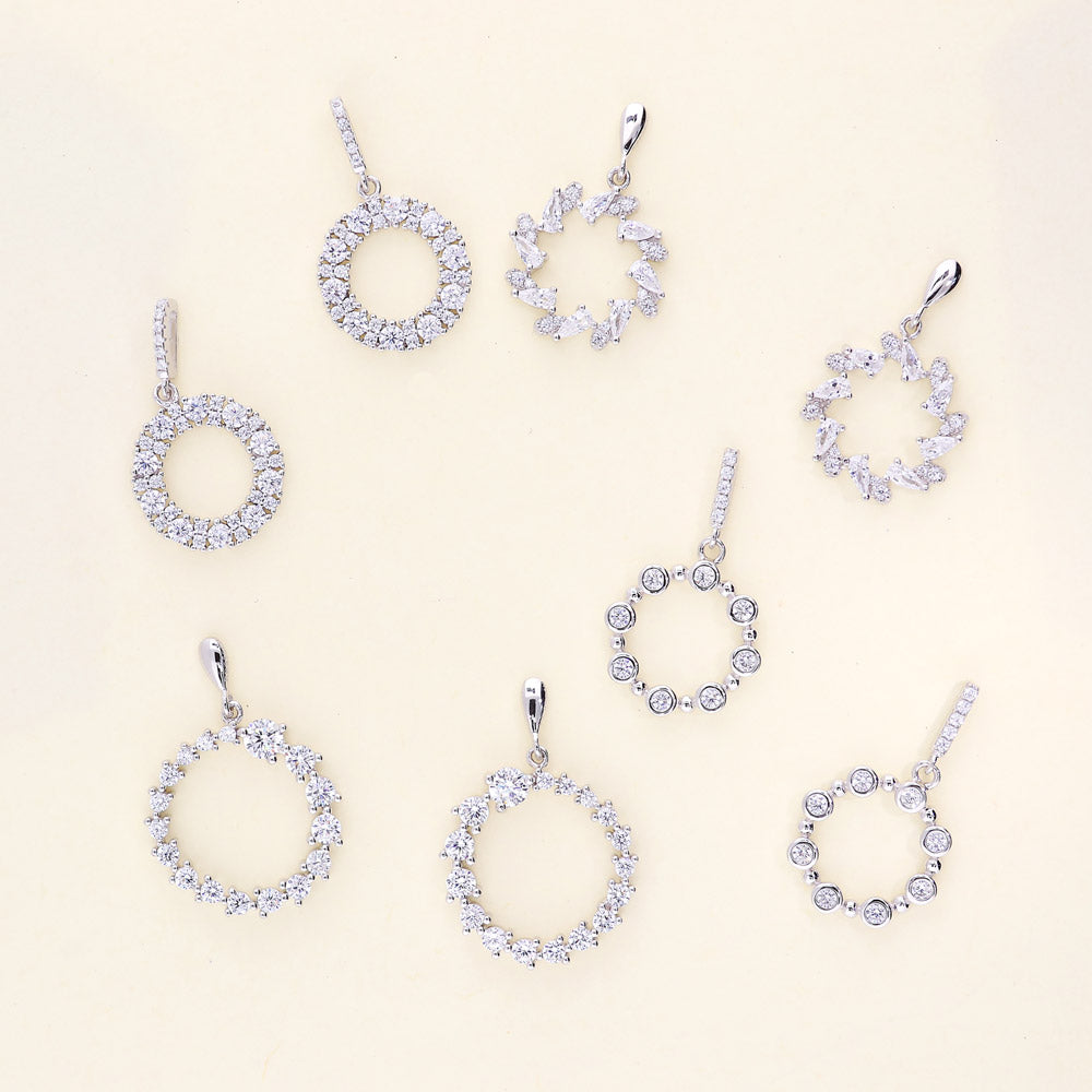 Flatlay view of Wreath Open Circle CZ Dangle Earrings in Sterling Silver