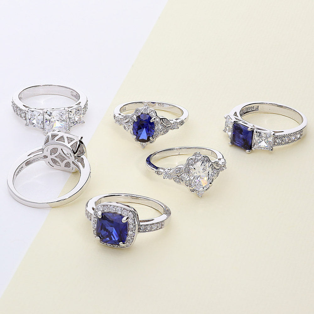 Flatlay view of Halo Simulated Blue Sapphire Cushion CZ Ring in Sterling Silver