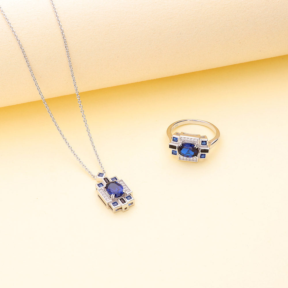Flatlay view of Art Deco Simulated Blue Sapphire CZ Pendant Necklace in Sterling Silver