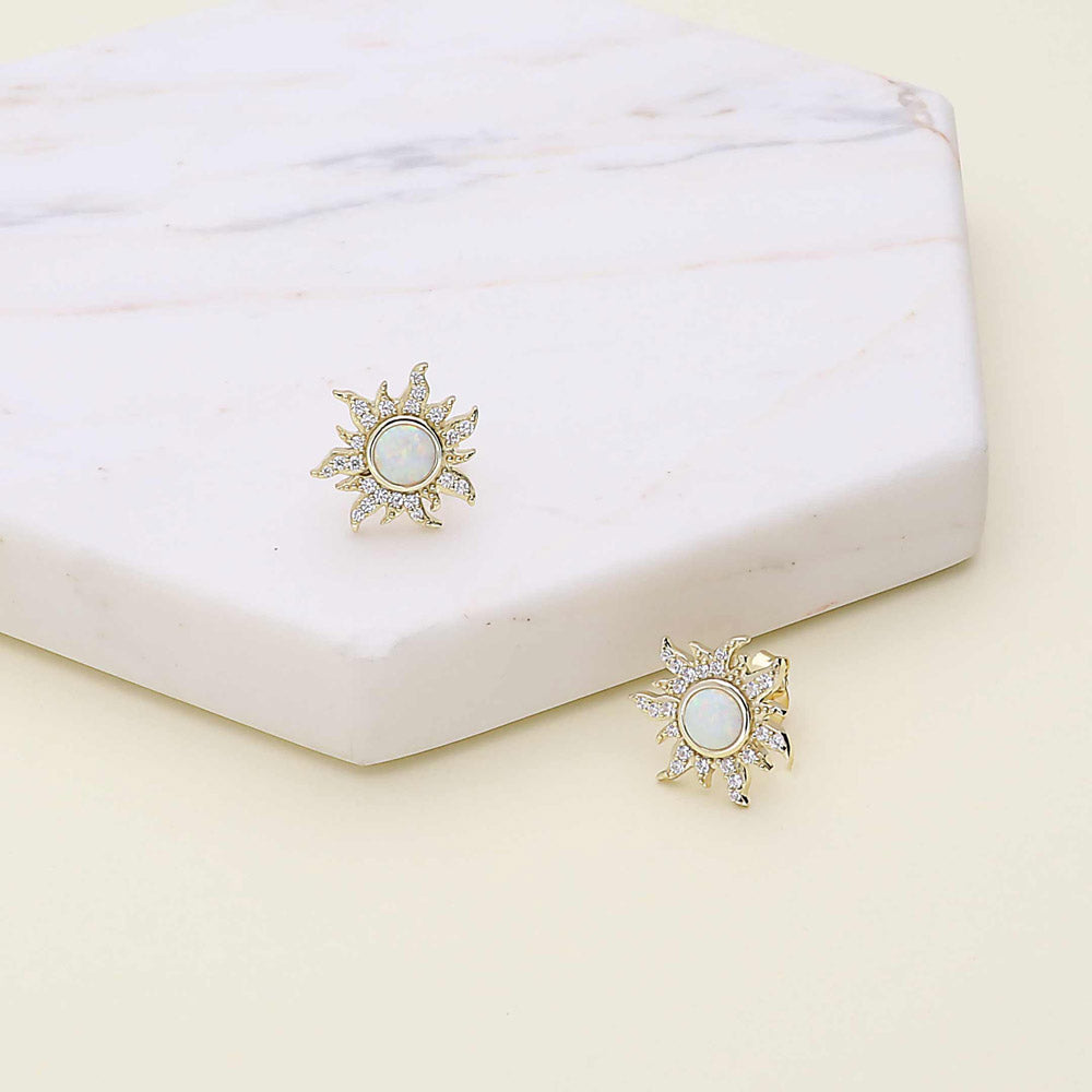 Flatlay view of Halo Sun Simulated Opal Round CZ Set in Gold Flashed Sterling Silver, 6 of 12