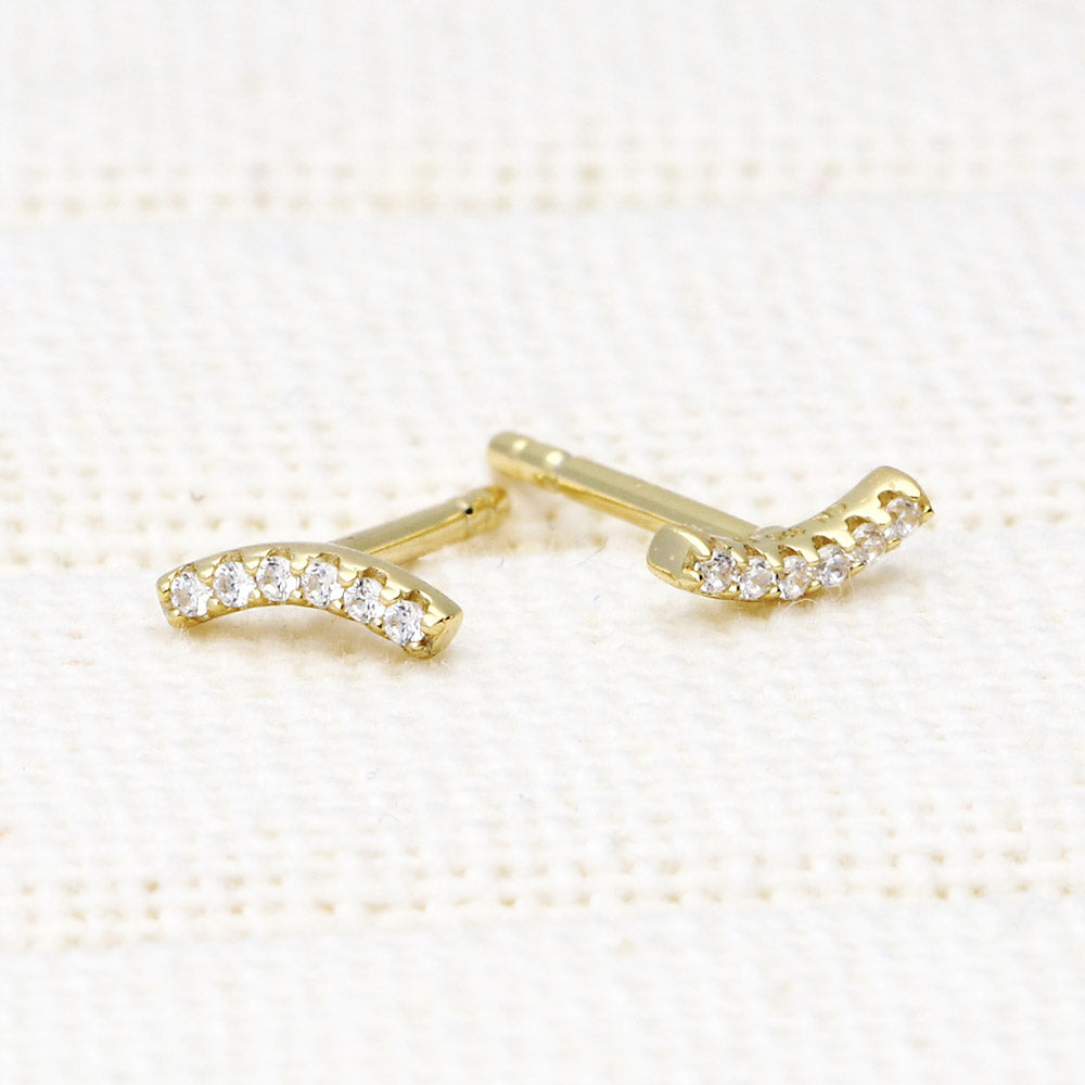 Flatlay view of Bar CZ Stud Earrings in Sterling Silver, Yellow Gold Flashed