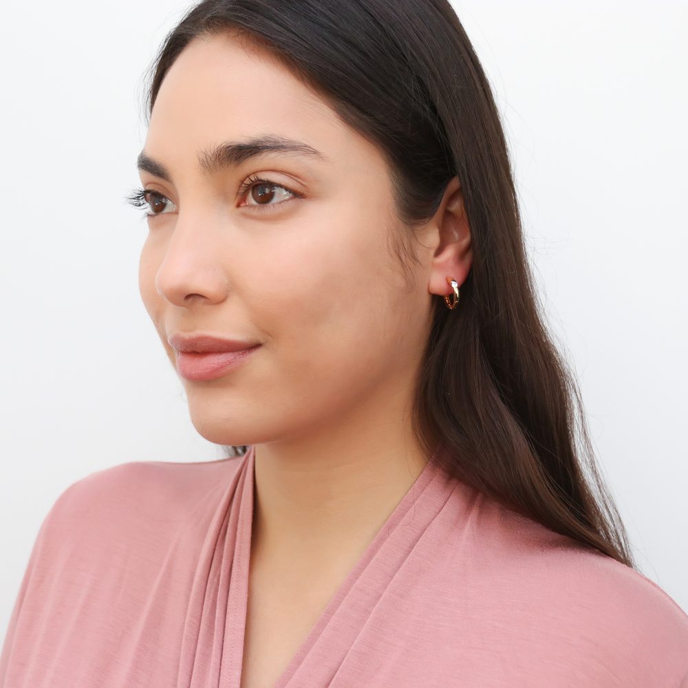 Model wearing Solitaire CZ Small Hoop Earrings Gold Flashed 0.6 inch, 0.6 inch, Gold-tone