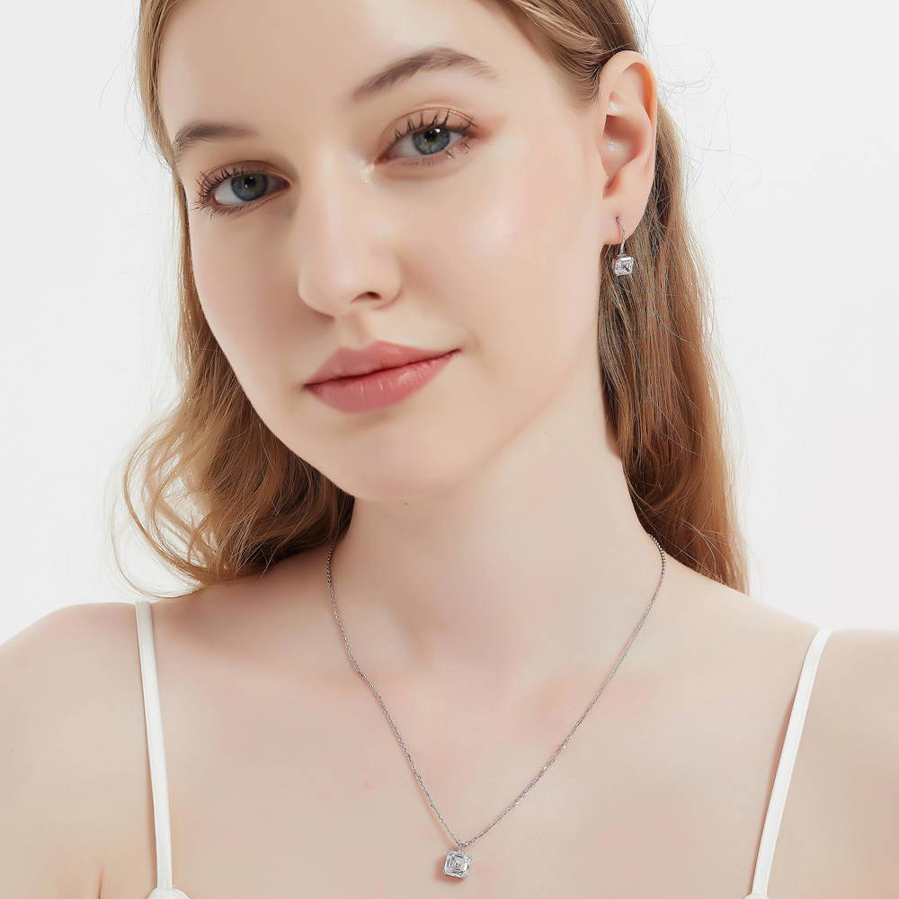 Model wearing Solitaire 3ct Asscher CZ Necklace in Sterling Silver, Rhodium Plated