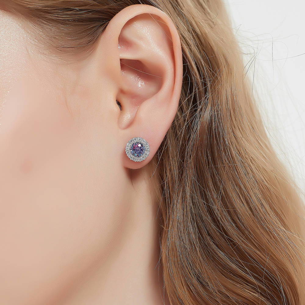 Model wearing Halo Kaleidoscope CZ Stud Earrings in Sterling Silver, Purple Aqua