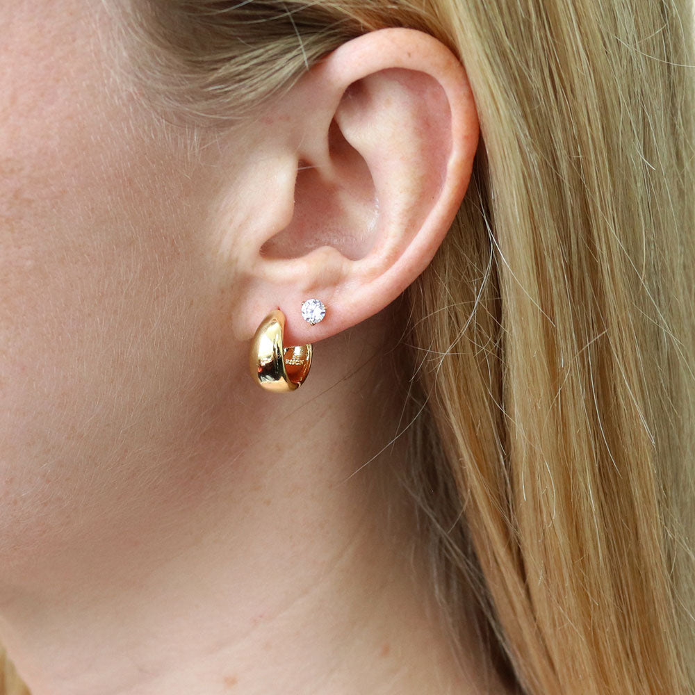 Model Wearing Dome Huggie Earrings, Solitaire Stud Earrings