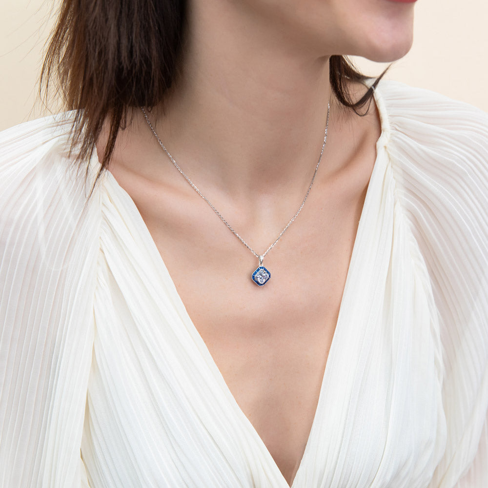 Model wearing Halo Art Deco Princess CZ Pendant Necklace in Sterling Silver