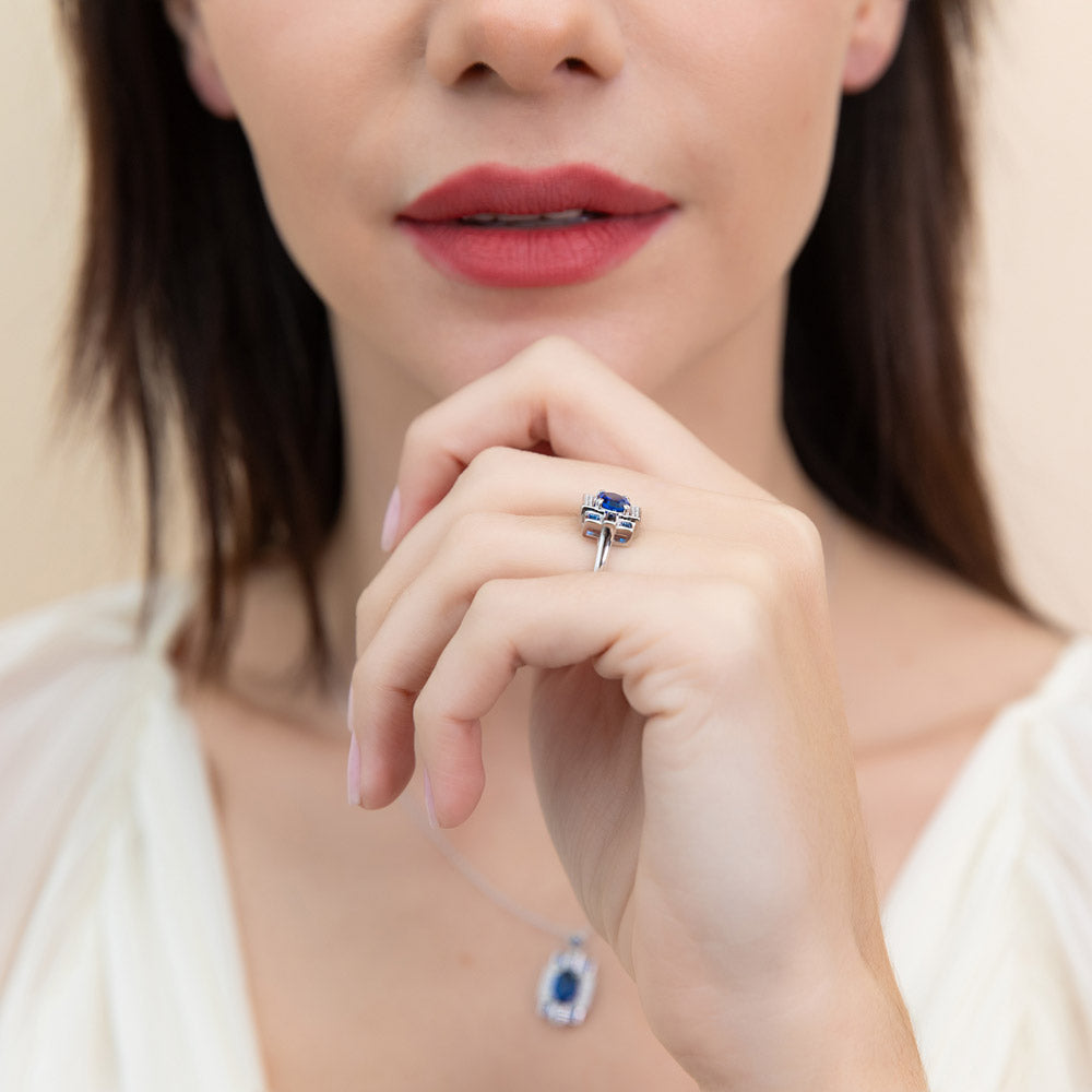 Model wearing Art Deco Simulated Blue Sapphire CZ Ring in Sterling Silver