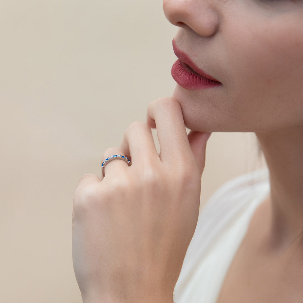 Model wearing Solitaire Art Deco 2.1ct Emerald Cut CZ Ring Set in Sterling Silver