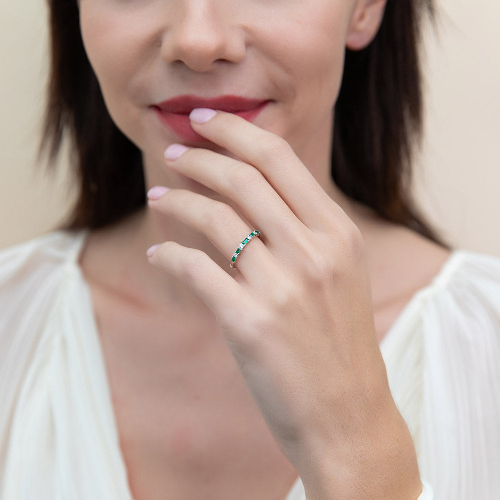Model wearing Solitaire Art Deco 2.1ct Emerald Cut CZ Ring Set in Sterling Silver