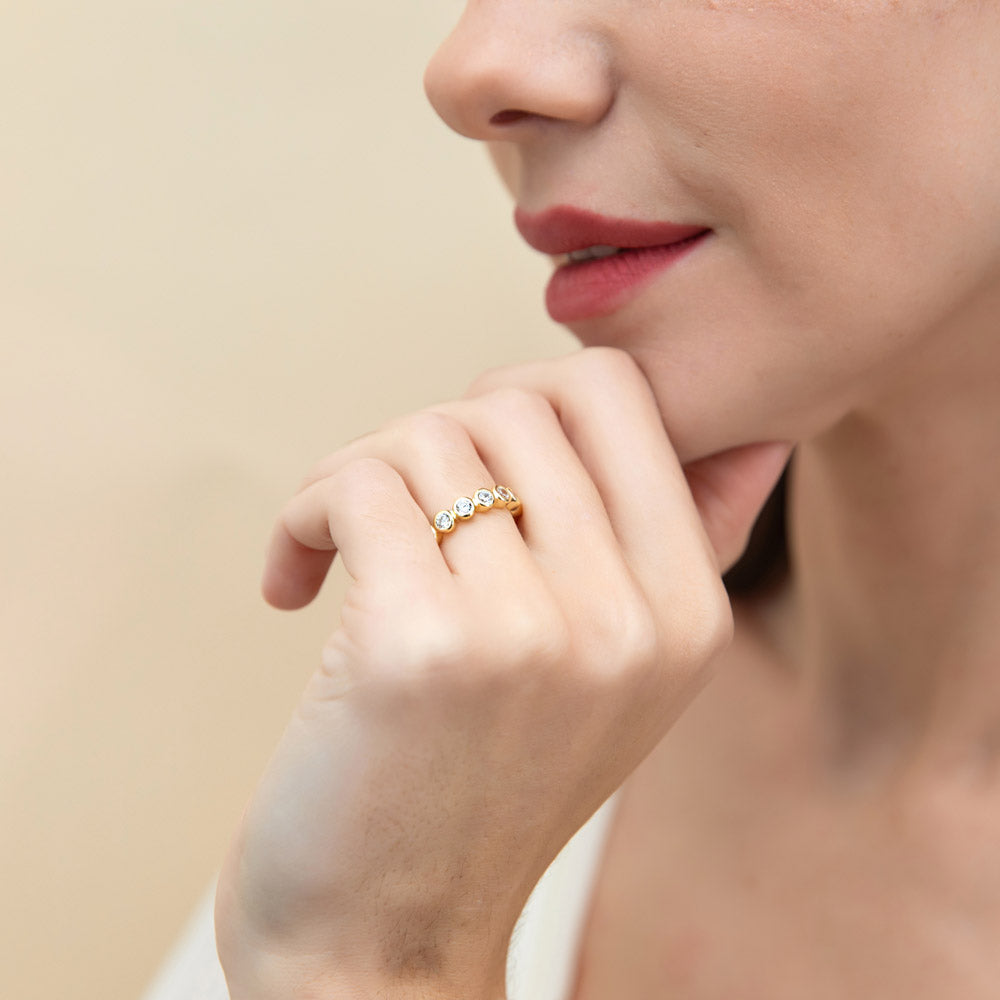Model wearing Bubble Bezel Set CZ Eternity Ring in Gold Flashed Sterling Silver