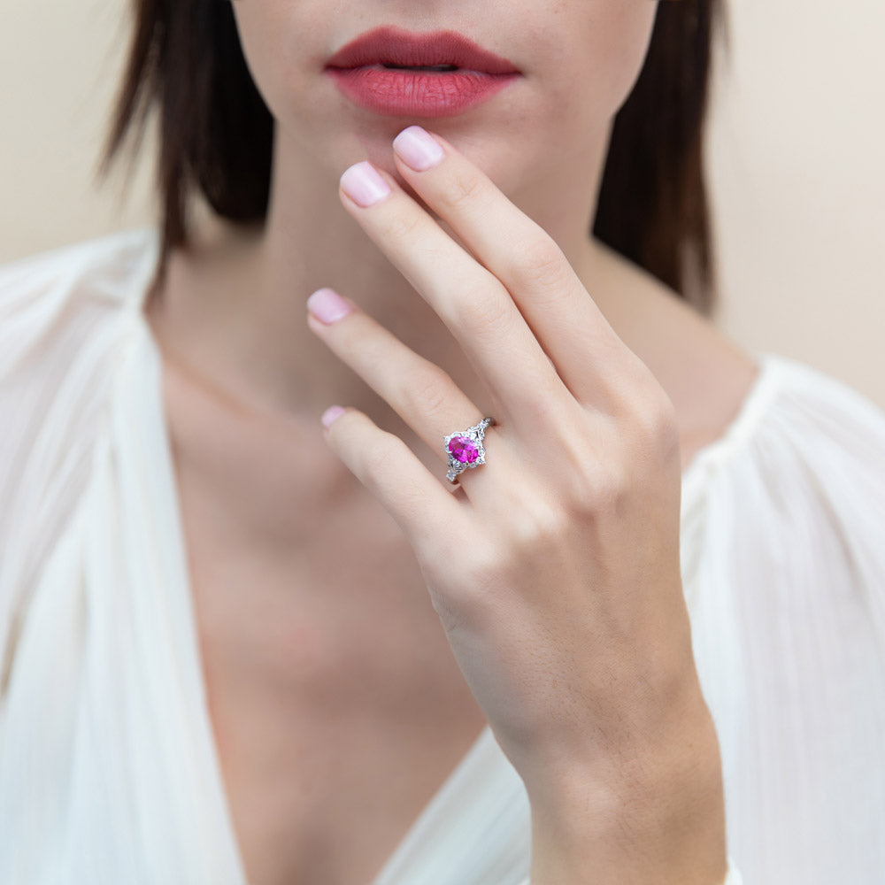 Model wearing Halo Art Deco Pink Oval CZ Ring in Sterling Silver