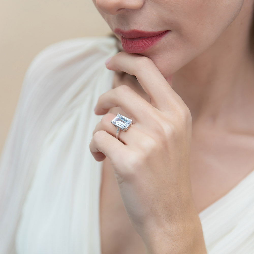 Model wearing Solitaire 8.5ct Emerald Cut CZ Statement Ring in Sterling Silver