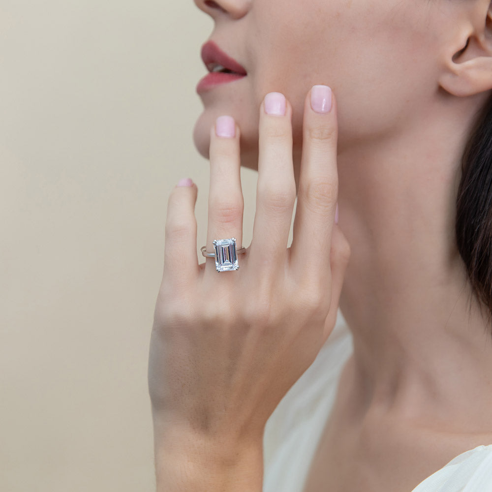 Model wearing Solitaire 8.5ct Emerald Cut CZ Statement Ring in Sterling Silver