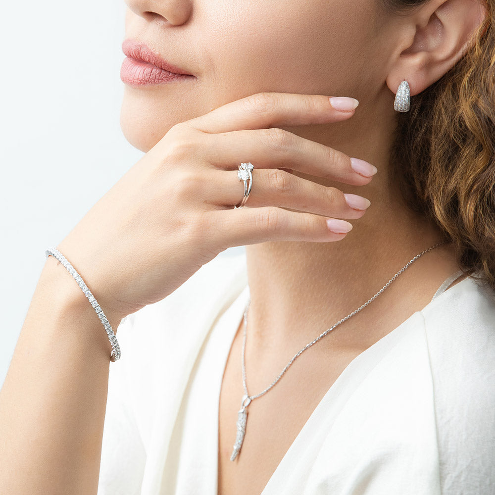 Model wearing Flexible CZ Bangle in Sterling Silver, 2.5mm / 7 inch