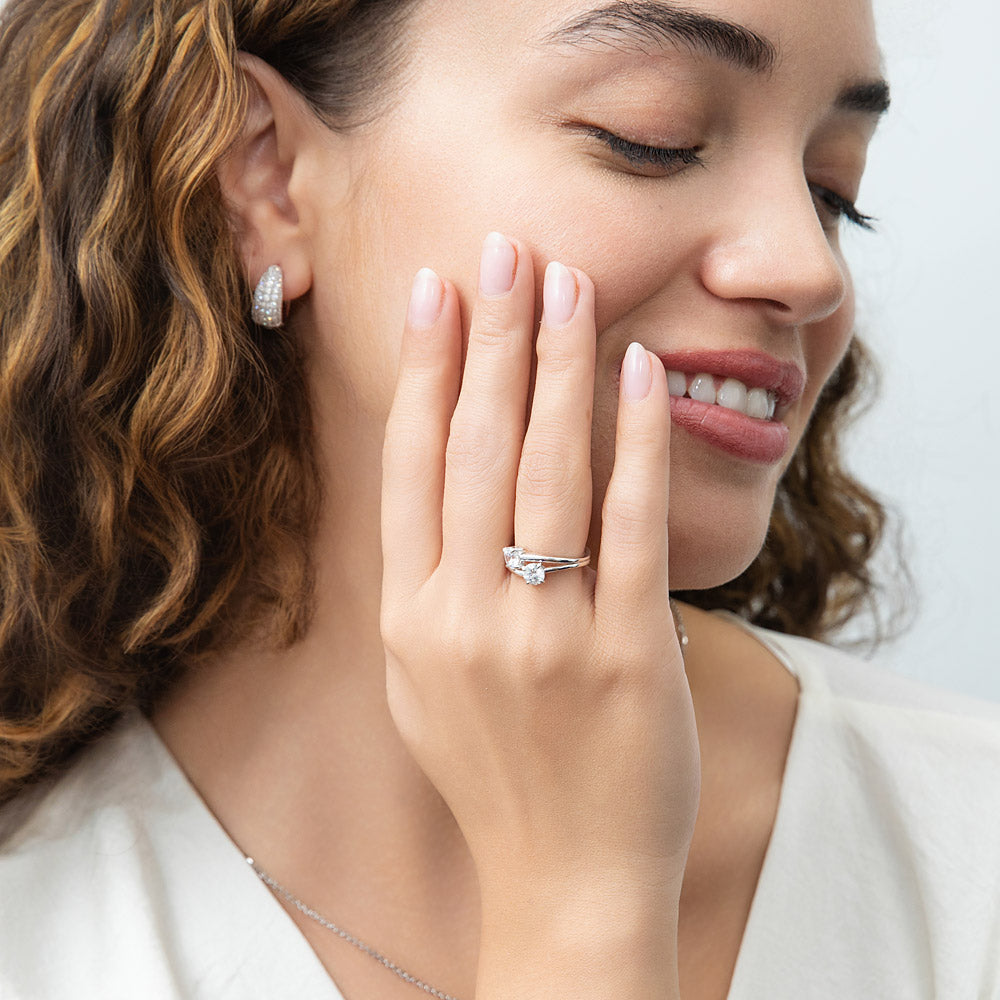 Model Wearing 2-Stone Split Shank Ring, Dome Hoop Huggie Earrings