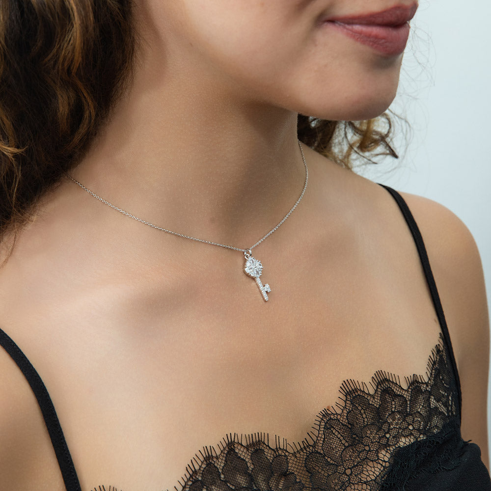 Model wearing Key CZ Pendant Necklace in Sterling Silver, Clear Color