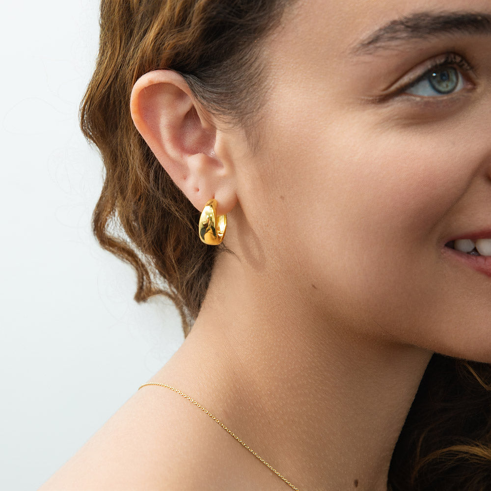 Model Wearing Dome Hoop Earrings