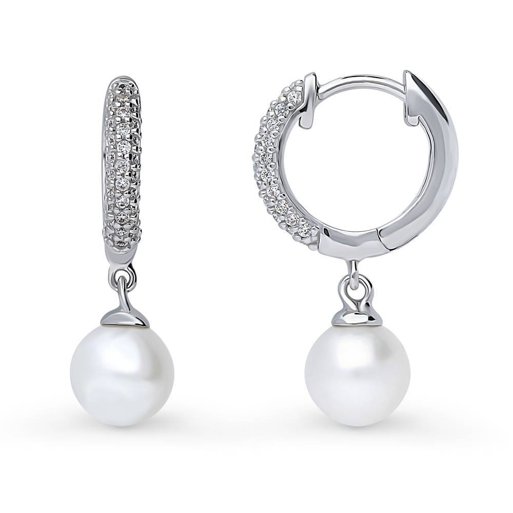 Front view of Solitaire White Round Cultured Pearl Earrings in Sterling Silver
