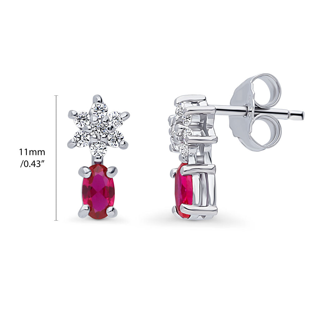 Front view of Flower Simulated Ruby CZ Stud Earrings in Sterling Silver