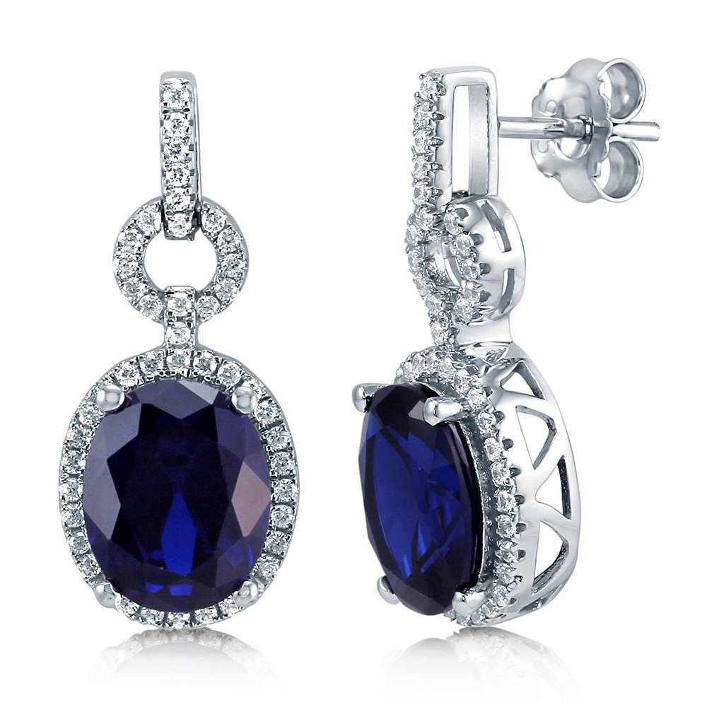 Halo Simulated Blue Sapphire Oval CZ Dangle Earrings in Sterling Silver, 1 of 3