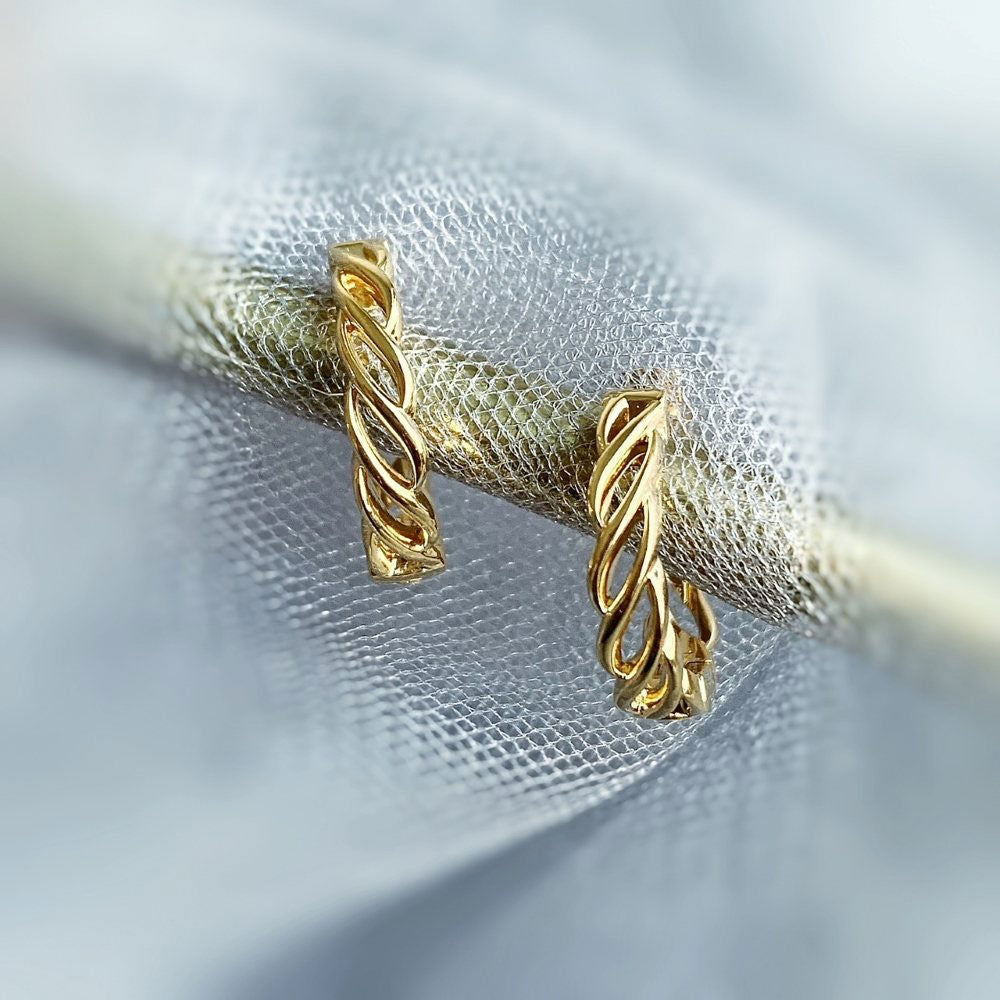 Flatlay view of Woven Medium Hoop Earrings in Sterling Silver 0.72 inch