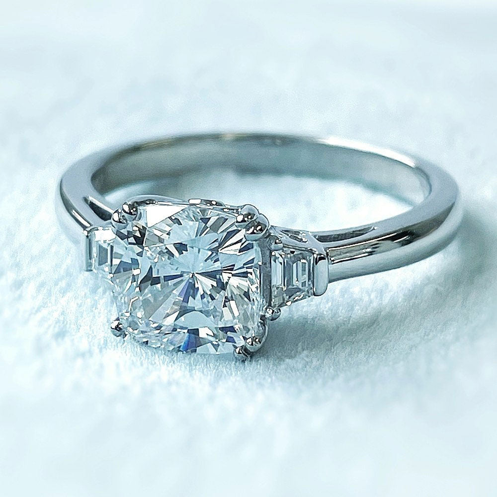 Flatlay view of 3-Stone Cushion CZ Ring in Sterling Silver