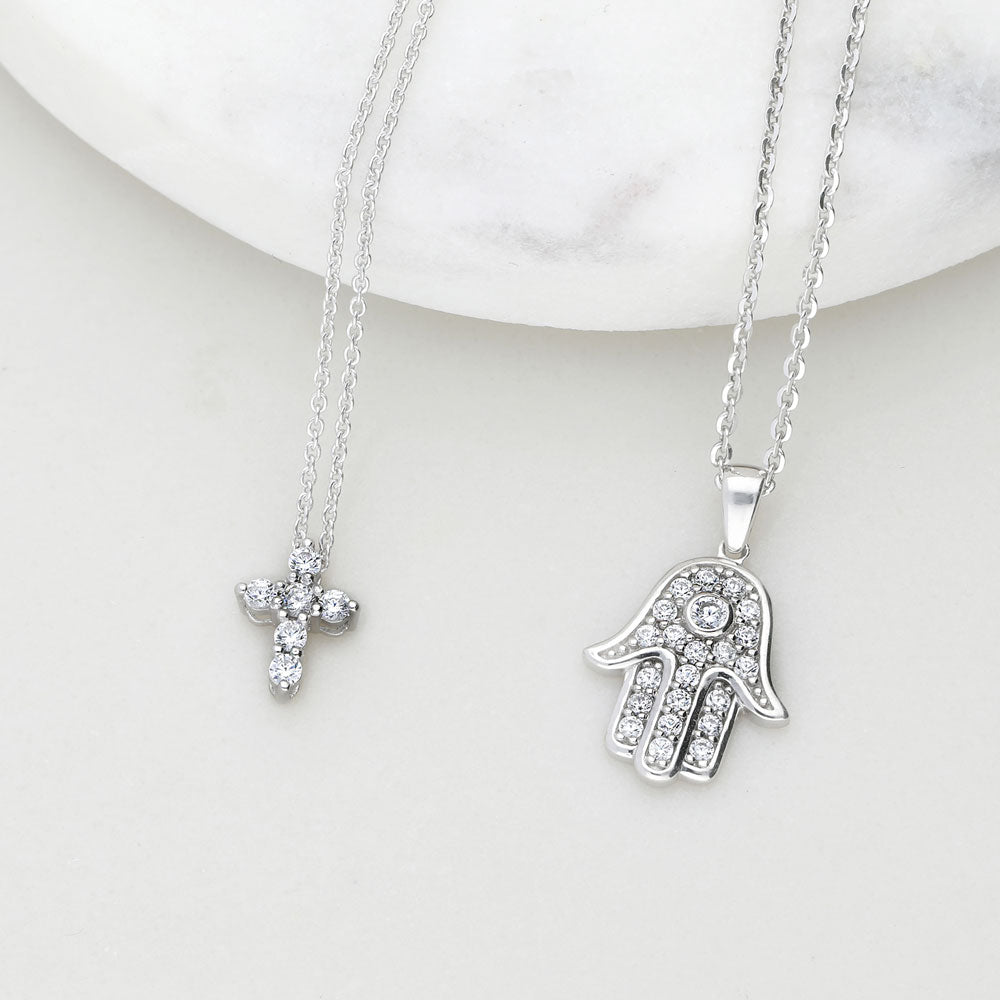 Flatlay view of Hamsa Hand CZ Pendant Necklace in Sterling Silver