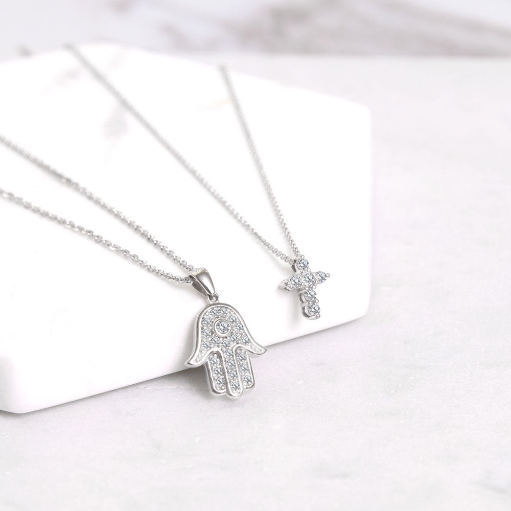 Flatlay view of Hamsa Hand CZ Pendant Necklace in Sterling Silver
