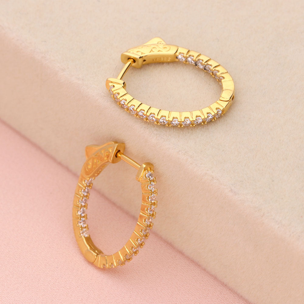 Flatlay view of Oval CZ Small Inside-Out Hoop Earrings in Sterling Silver 0.8 inch, Yellow Gold Flashed