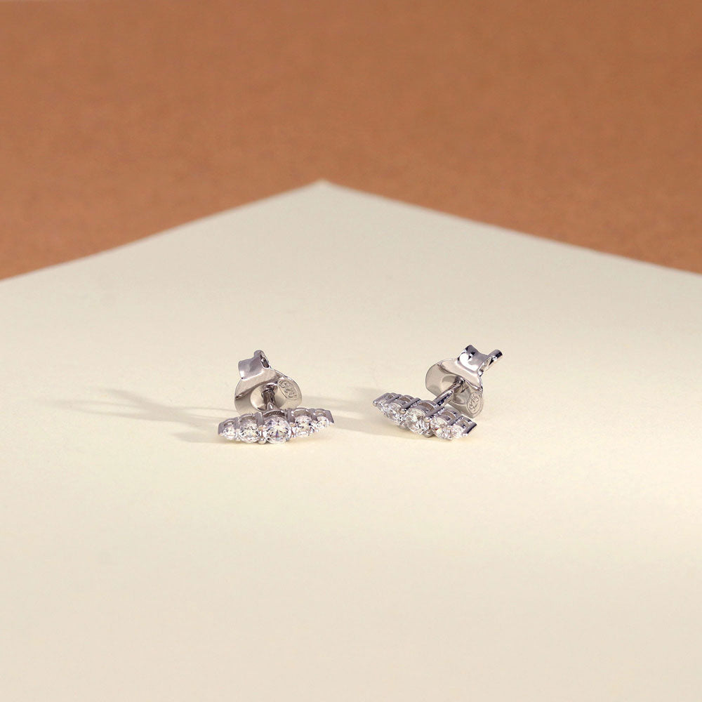 Flatlay view of Bar CZ Stud Earrings in Sterling Silver