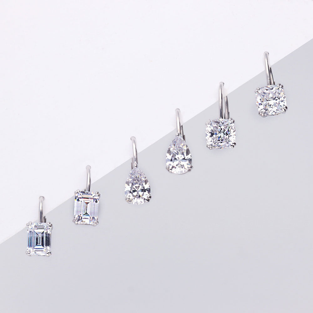 Flatlay view of Solitaire 2.6ct Pear CZ Leverback Dangle Earrings in Sterling Silver