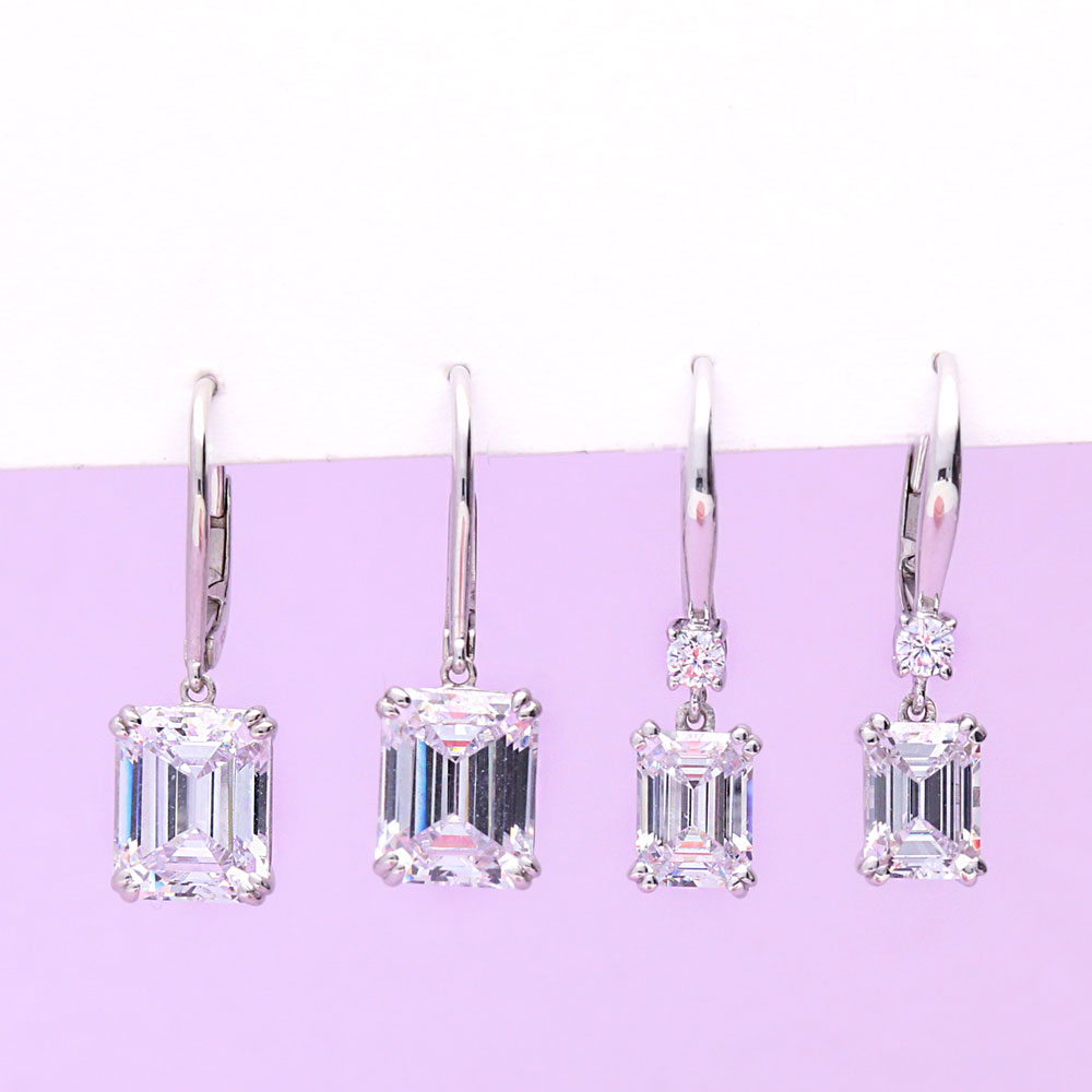Flatlay view of Solitaire Emerald Cut CZ Leverback Earrings in Sterling Silver, Yellow Gold Flashed