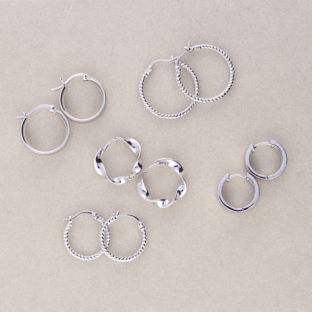 Flatlay view of Cable Medium Hoop Earrings in Sterling Silver 0.68 inch