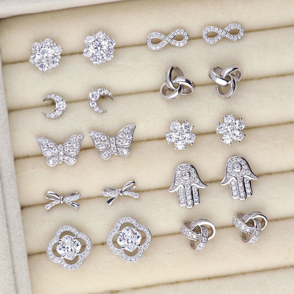 Flatlay view of Flower CZ Stud Earrings in Sterling Silver