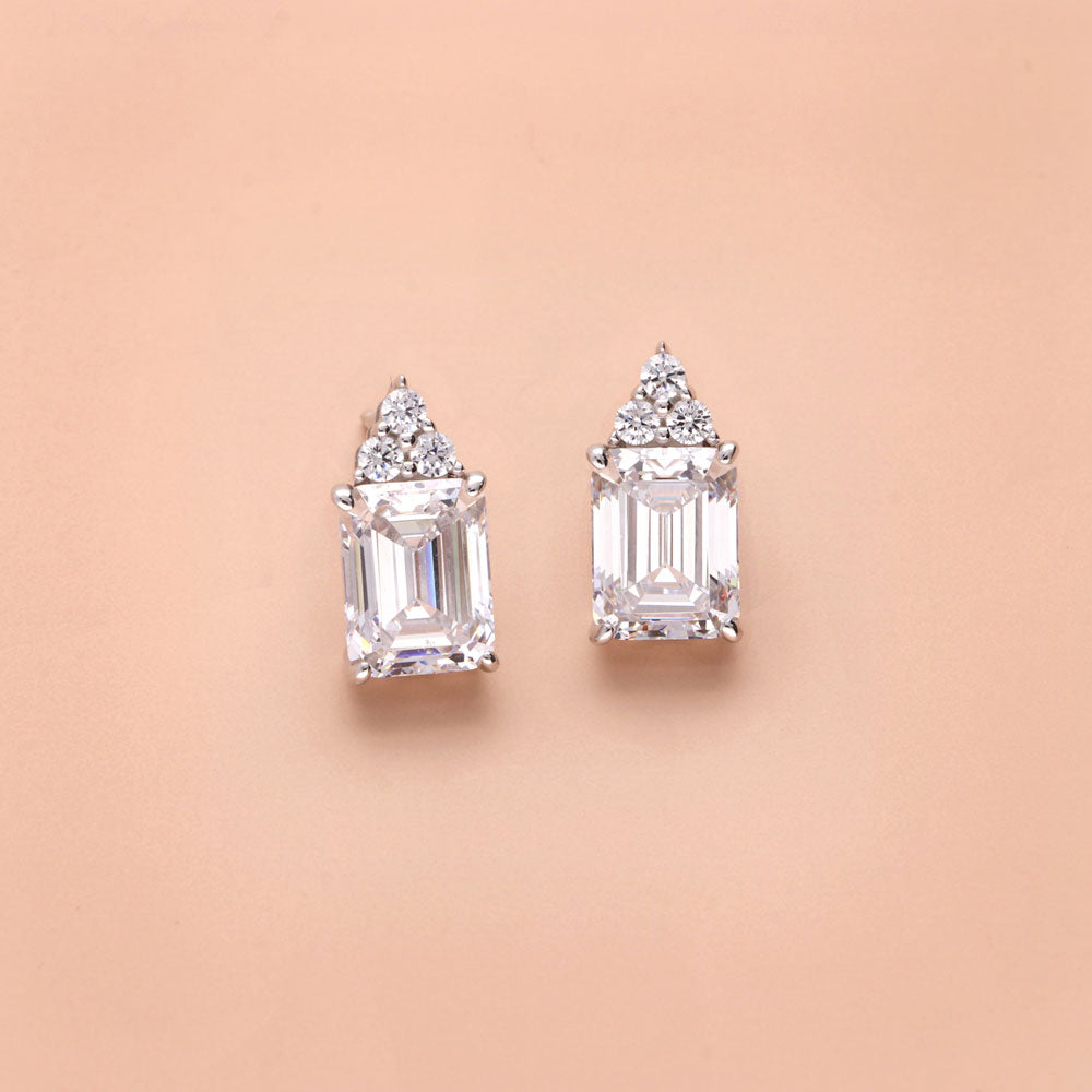 Flatlay view of Solitaire 4.2ct Emerald Cut CZ Stud Earrings in Sterling Silver