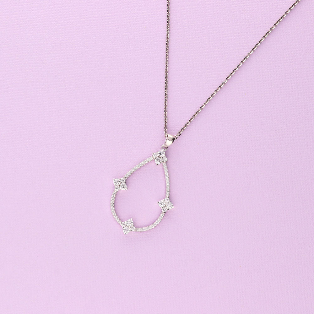 Flatlay view of Flower Teardrop CZ Pendant Necklace in Sterling Silver