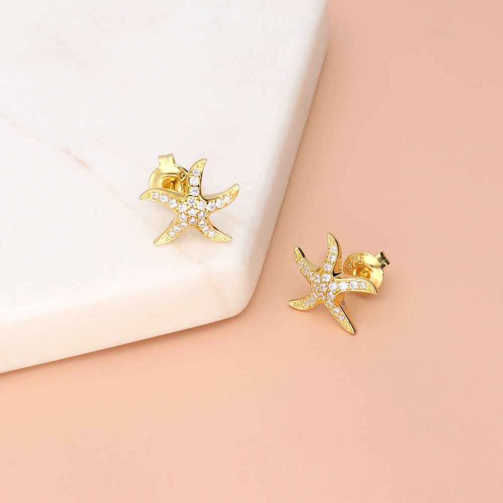 Flatlay view of Starfish CZ Stud Earrings in Sterling Silver