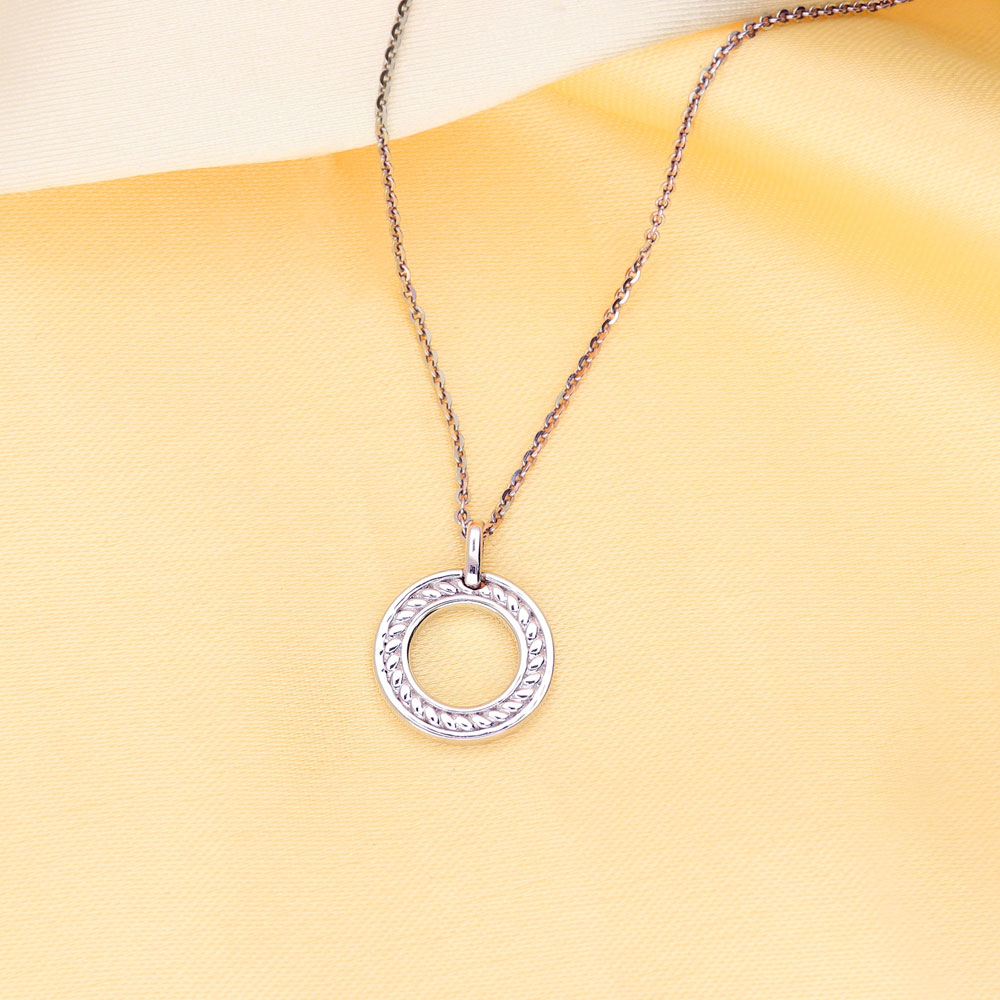 Flatlay view of Open Circle Cable Pendant Necklace in Sterling Silver