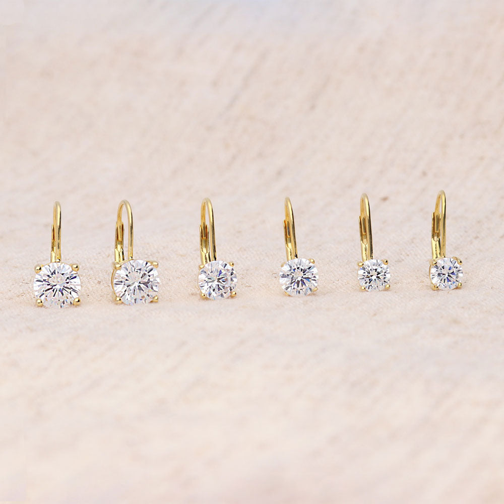 Flatlay view of Solitaire Round CZ Leverback Earrings in Gold Flashed Sterling Silver