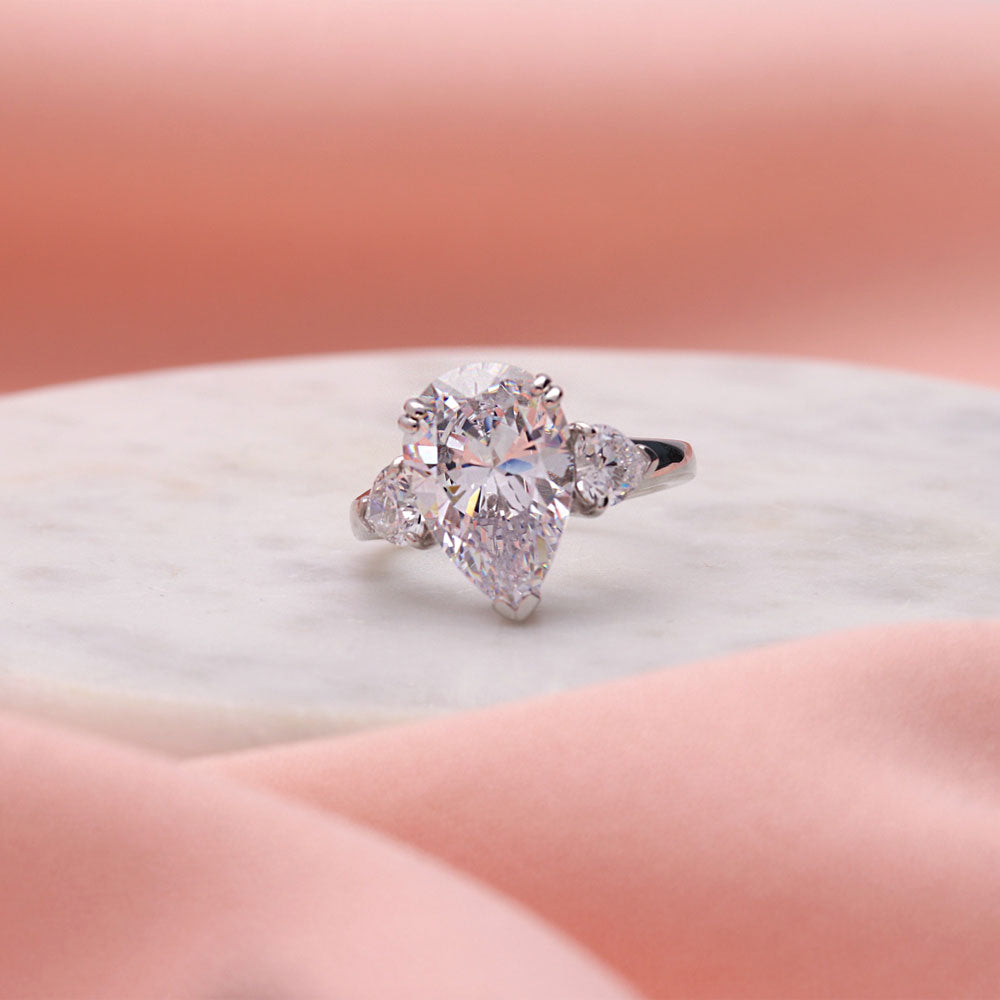 Flatlay view of 3-Stone Pear CZ Statement Ring in Sterling Silver