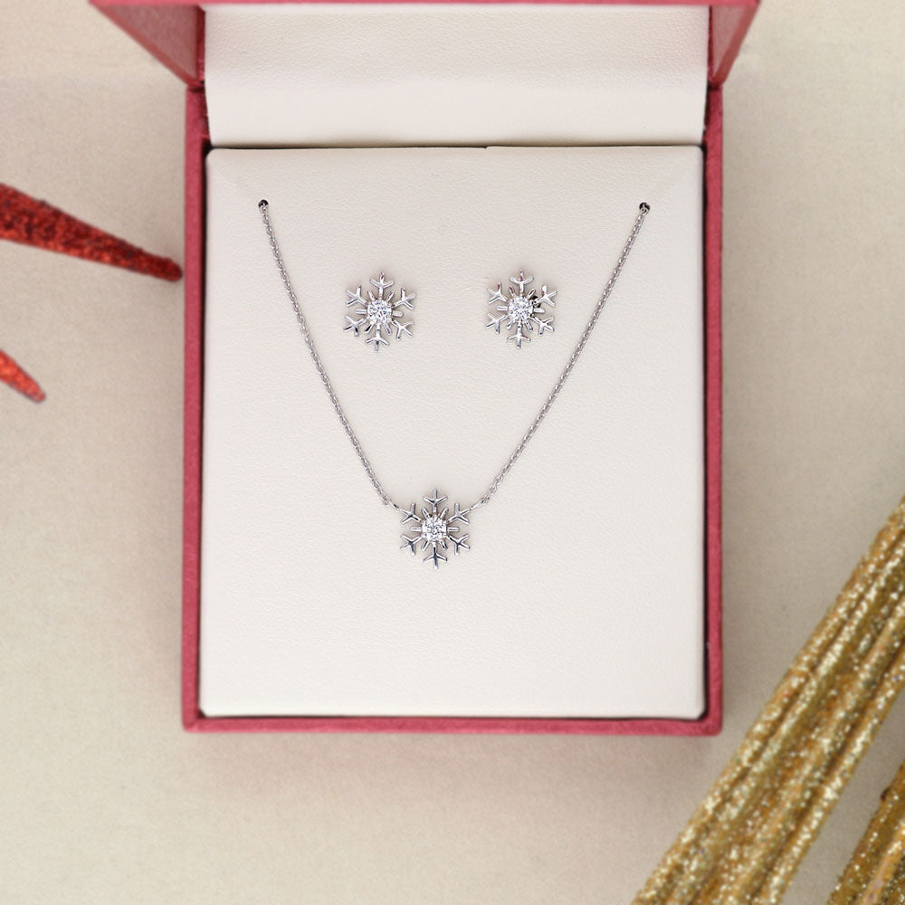 Flatlay view of Snowflake CZ Pendant Necklace in Sterling Silver
