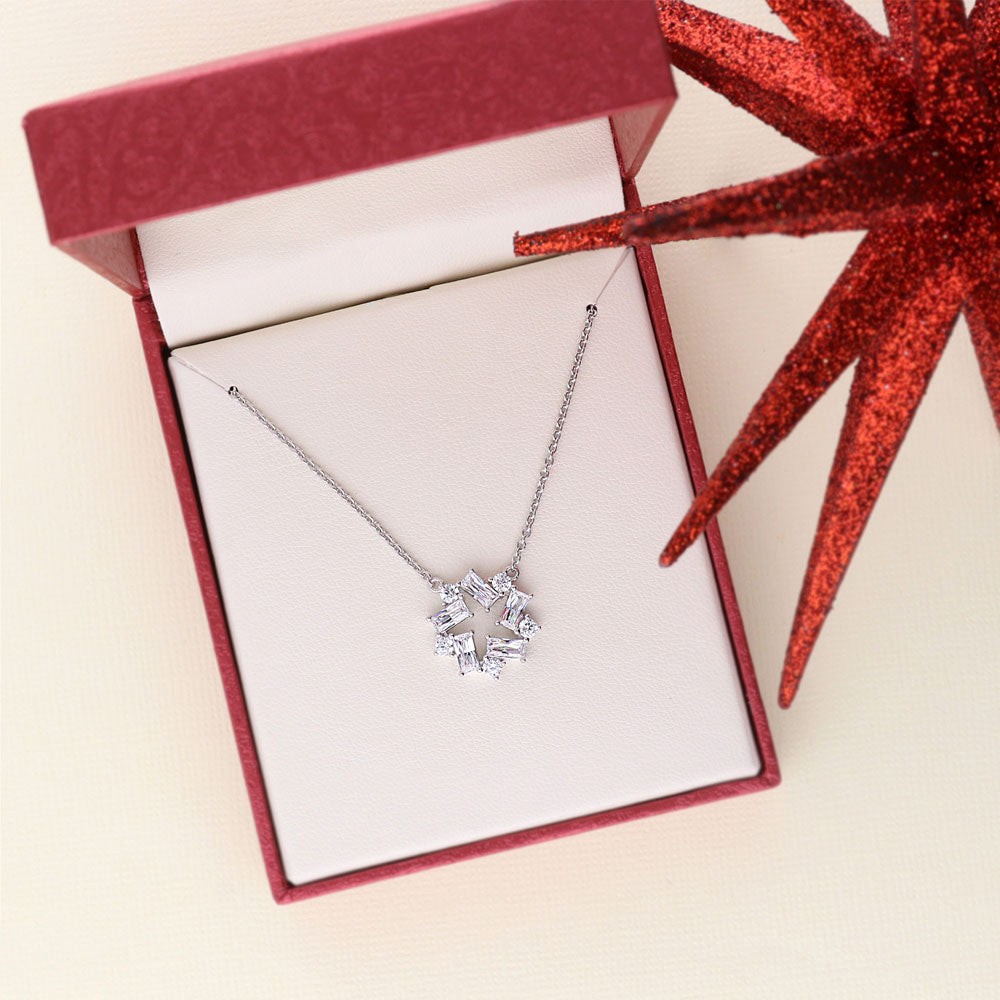 Flatlay view of Wreath CZ Necklace and Earrings Set in Sterling Silver