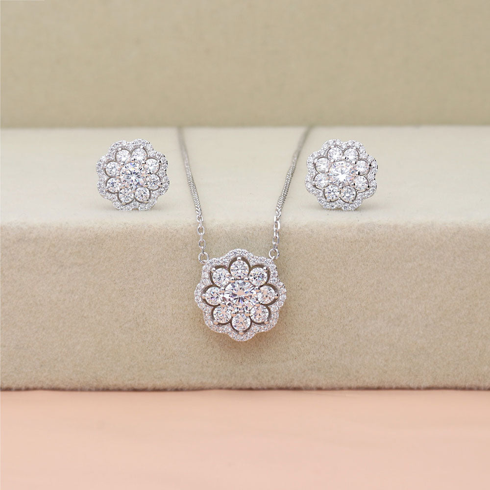 Flatlay view of Flower Halo CZ Pendant Necklace in Sterling Silver, 7 of 10