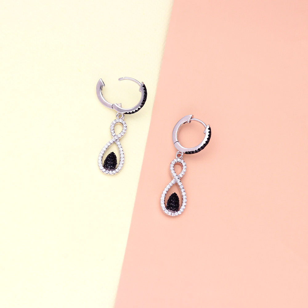 Flatlay view of Black and White Infinity CZ Set in Sterling Silver